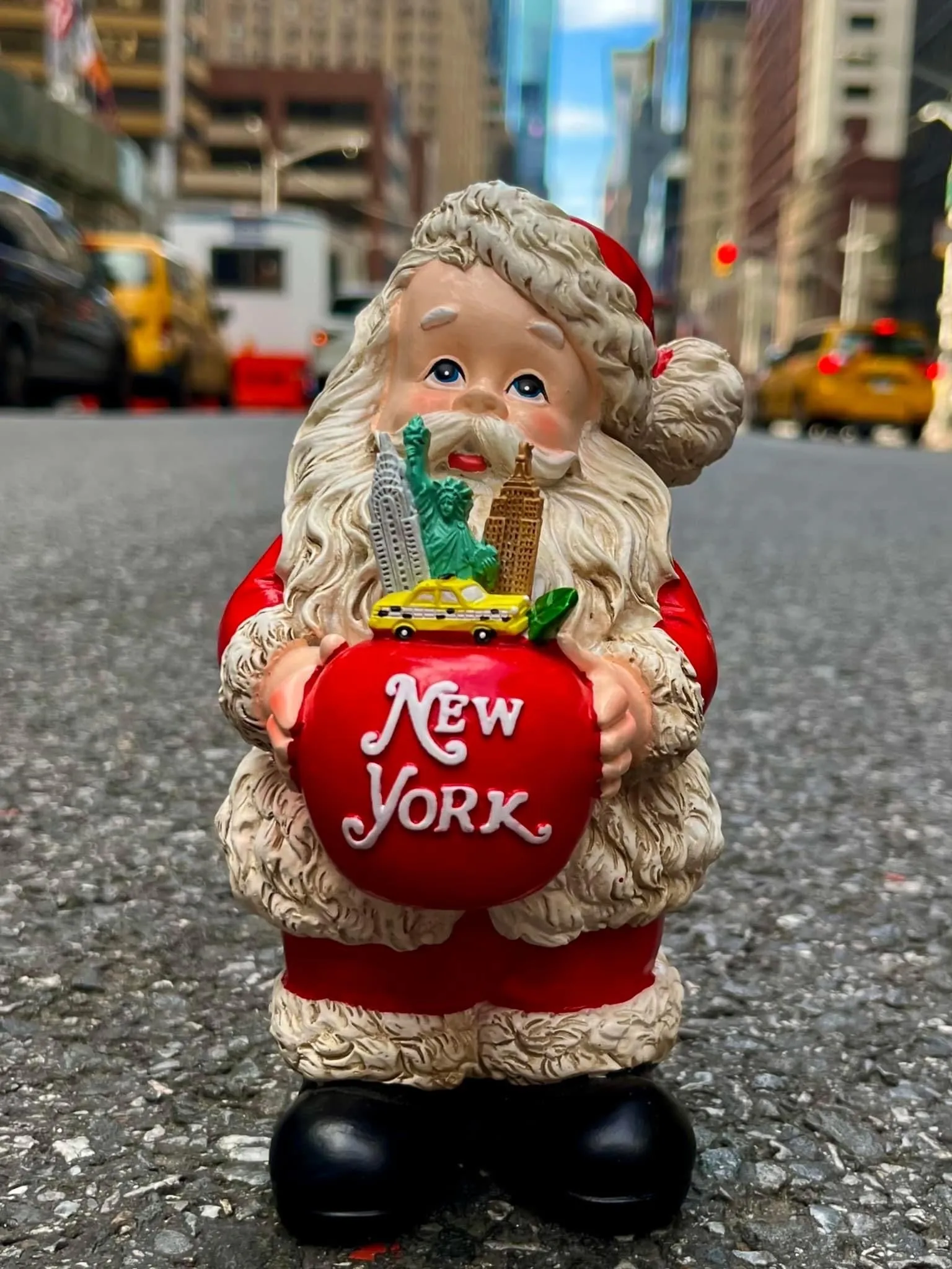 New York Santa Table Piece Holding Apple, Taxi, Statue of Liberty, Empire State and Chrysler Building